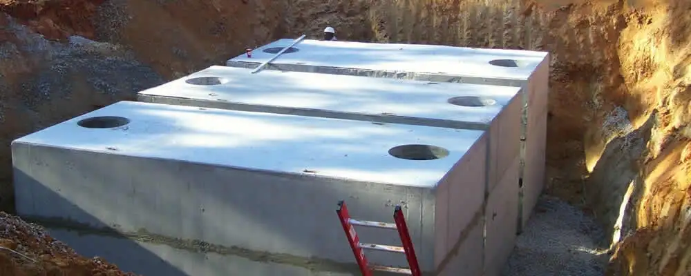 Septic tank installation site with a newly placed concrete tank in Las Vegas, NV